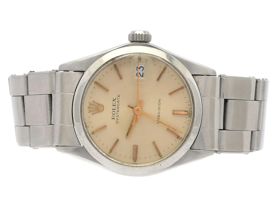 ROLEX, Oysterdate, Precision (T Swiss T), Ref nr. 6466, Serie nr. 3764493, Cal 1225, Boett nr. 6466, midsize, 30,5 mm, manuell, plexiglas, datum, skadad urtavla, skadad boett (hårt polerad, se bild), defekt (akut servicebehov), Oysterlänk (flushfit, storleksändras ej), viklås, längd 170 mm, Ref nr. /362, ca 1974. — Klockor/Rolex — Kaplans