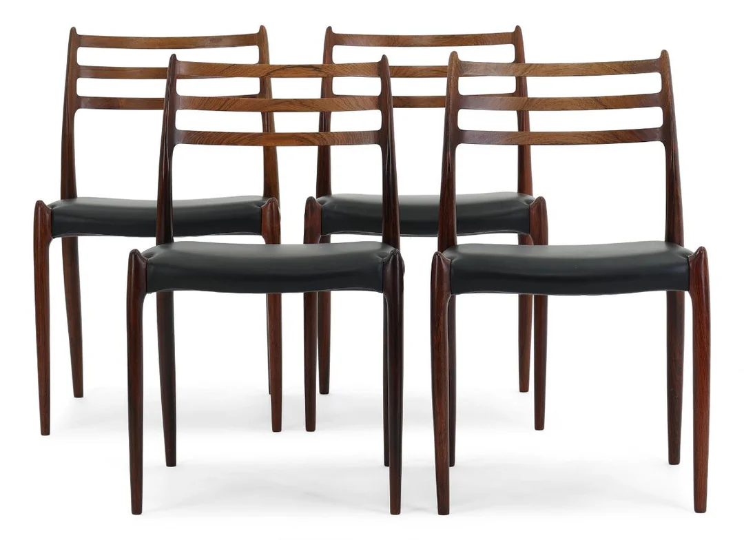 Set of four chairs in rosewood. Seat upholstered in black leather. Model 78. Designed 1962. Manufactured by J.L. Møller, Højbjerg. (4) — Modern Furniture — Bruun Rasmussen