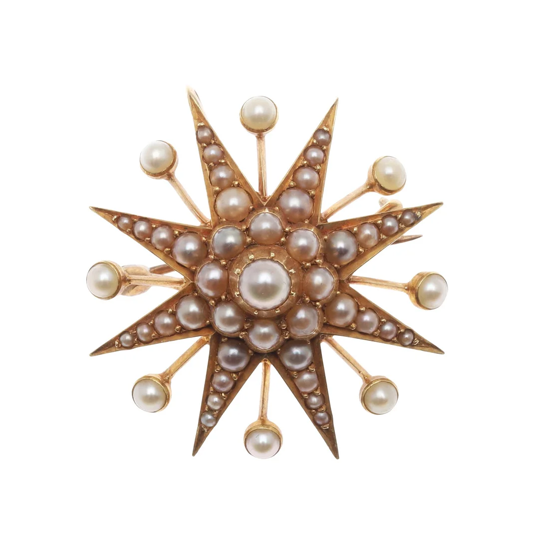A VICTORIAN GOLD AND PEARL STAR BROOCH. — Brooches & Pendants — Lawrences Auctioneers