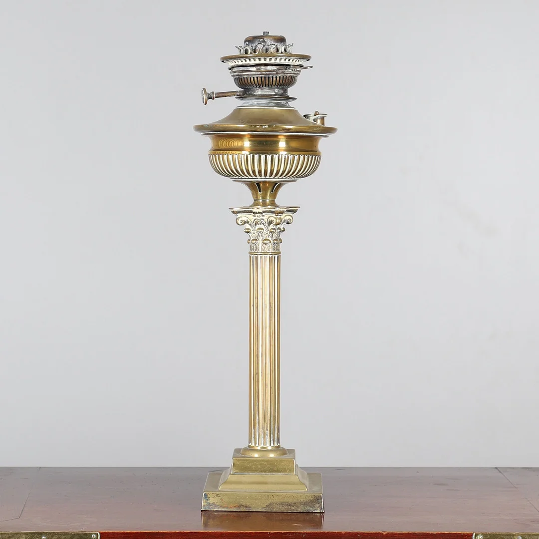 A BRASS CORINTHIAN COLUMN OIL LAMP. — Pewter, Brass & Copper — Lawrences Auctioneers