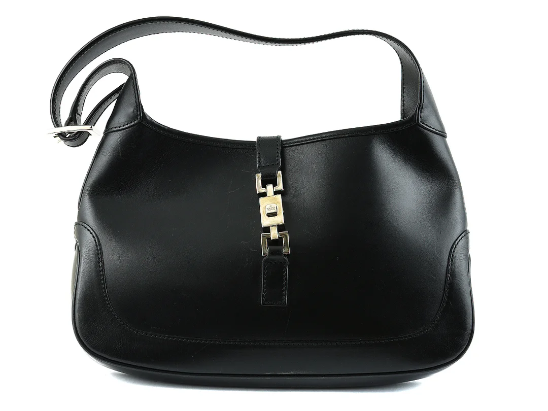 VÄSKA, GUCCI, Jackie, svart läder, spänne, 26x17x3cm, dustbag, slitage — Accessoarer/Väskor — Kaplans