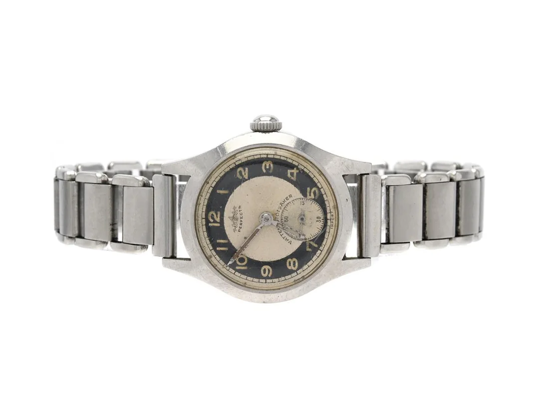 PERFECTA, herrur, 29 mm, Boett nr. 61543, stål, manuell, plexiglas, liten sekundvisare, skadad urtavla, ca 1945, metallänk ej original. — Klockor/Perfecta — Kaplans