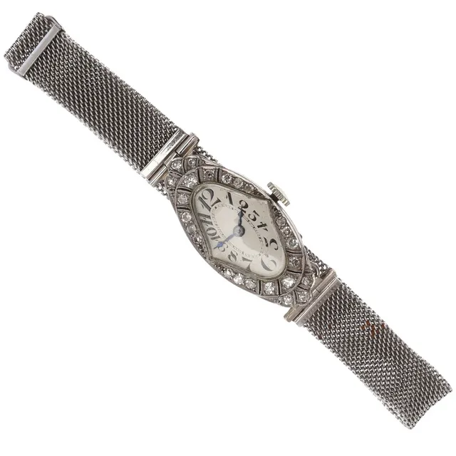 AN ART DECO LADY'S DIAMOND COCKTAIL WRISTWATCH.