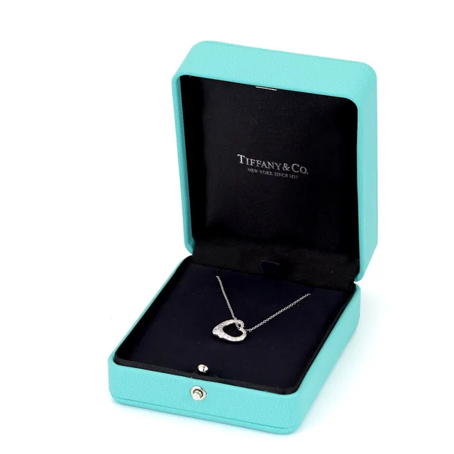 TIFFANY & CO. PLATINUM DIAMOND SET HEART NECKLACE.