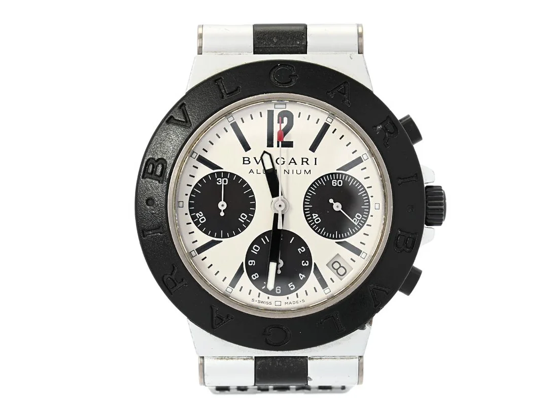 BVLGARI, Aluminium, Cal 080 TEEE, Verk nr. 100766, Serie nr. L 12264, Ref nr. AC 38 TA, kronograf, herrur, 38 mm, aluminium, automatisk, safirglas, datum, integrerat gummiband (se fördjupad info), originalspänne i aluminium, ca 2005. — Klockor/Bvlgari — Kaplans