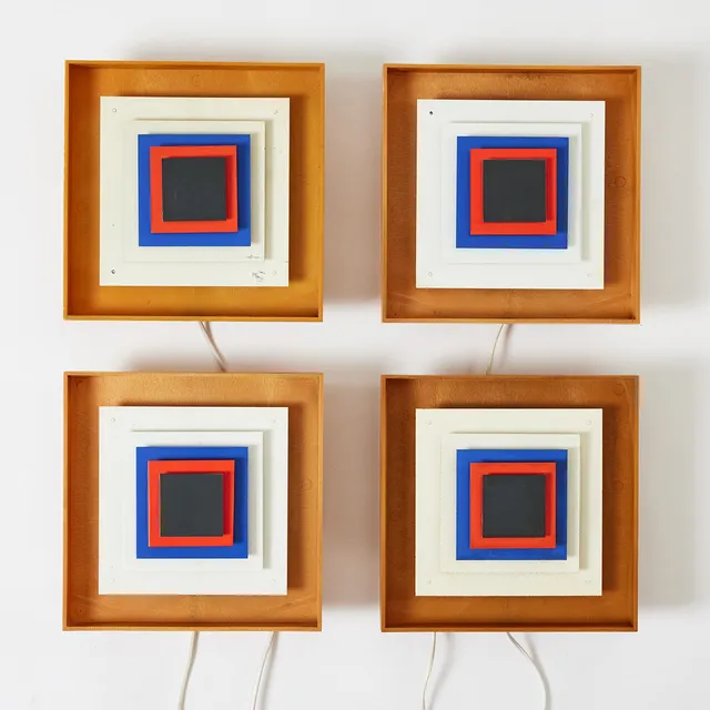 BENT KARLBY. “Kvadrille”, a set of four wall lamps, Lyfa, Denmark 1960s, plastic frames with metal screens painted in white, blue, red and black.