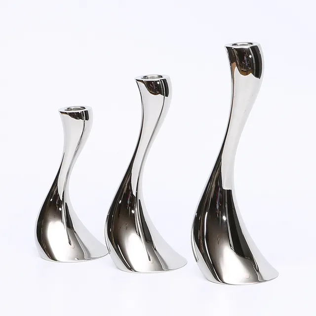 CONSTANTIN WORTMANN. Ljusstakar, 3 st, "Cobra", för Georg Jensen, Danmark.