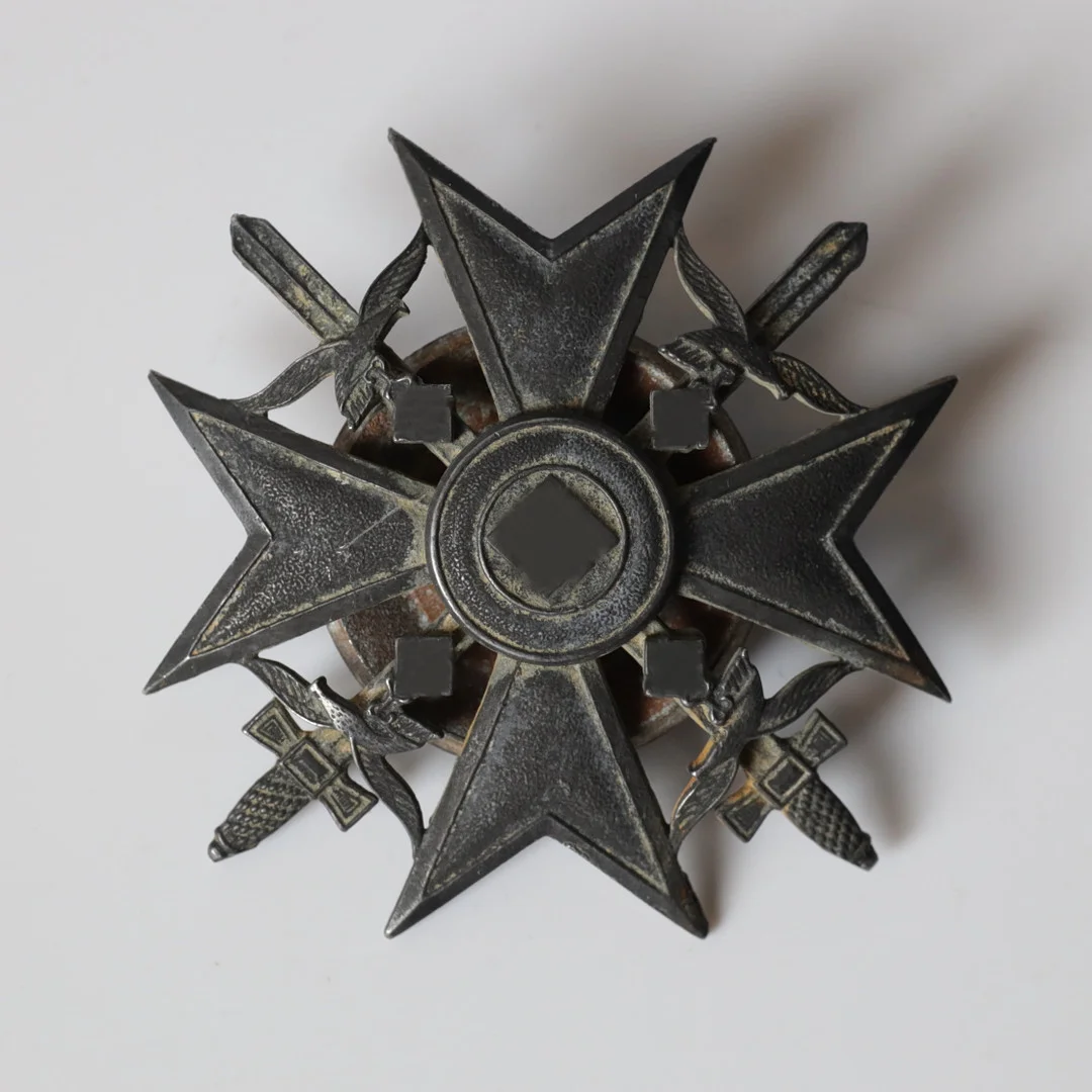 SPANIENKORSET, med svärd, brons, instiftad 1939. — Orders & Medals — Gomér & Andersson Nyköping