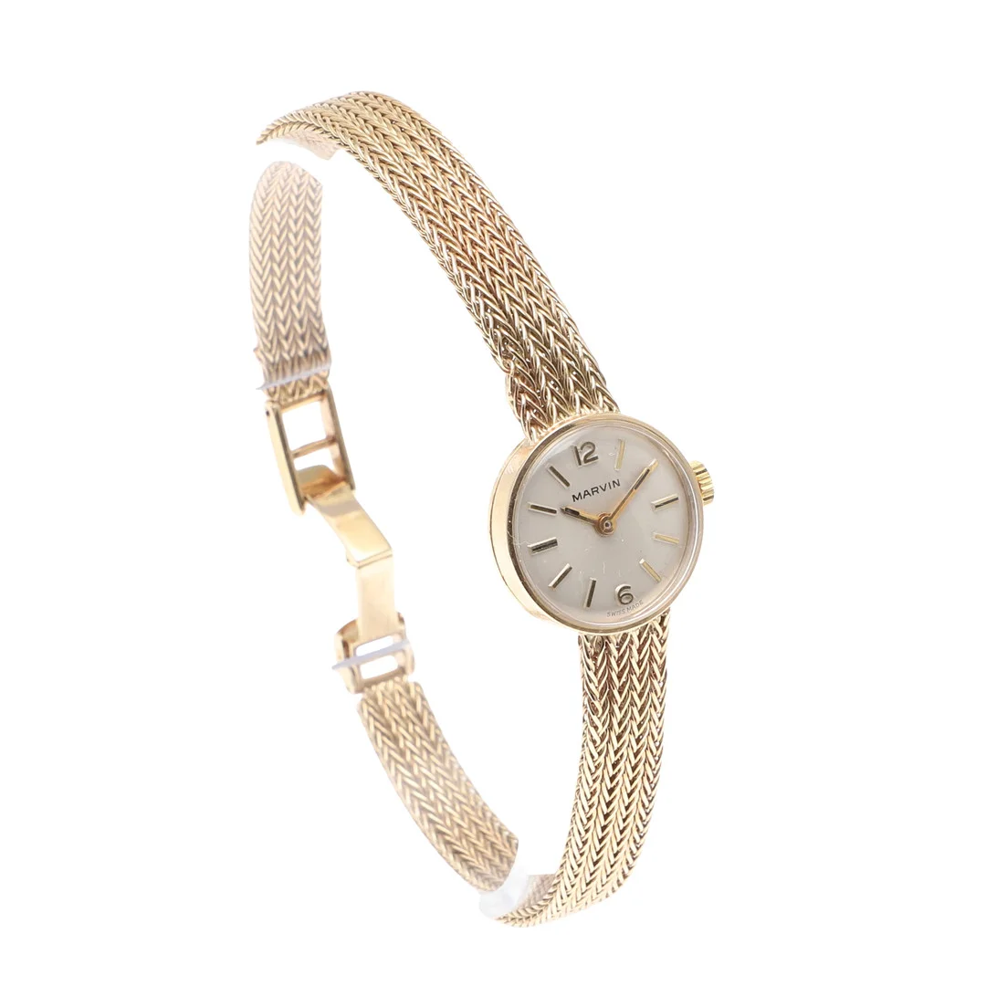 A LADY'S 9CT GOLD WRISTWATCH BY MARVIN. — Wristwatches — Lawrences Auctioneers