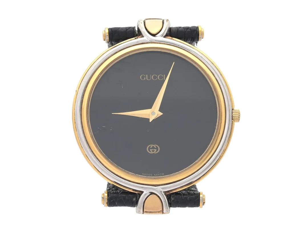 GUCCI, herrur, 32 mm, Serie nr. 022.166, Boett nr. 4500 M, doublé, quartz, mineralglas, defekt (går ej), integrerat läderband, originalspänne i gulmetall, ca 1990. — Klockor/Gucci — Kaplans