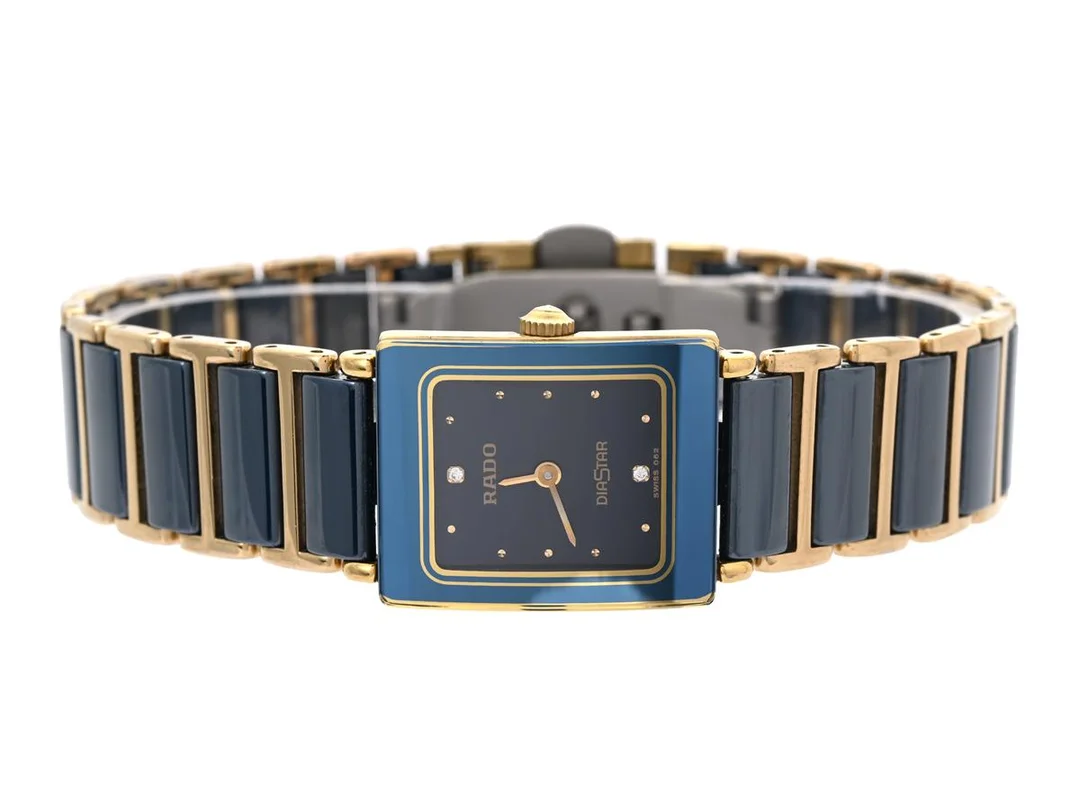 RADO, Integral, Diastar, Serie nr. 37703127, Boett nr. 153.0283.3N, damur, 18 x 22 mm, high-tech ceramics, quartz, safirglas, diamanter på urtavlan (2 st.), originallänk, viklås, Ref nr. 04403, ca 1992. — Klockor/Rado — Kaplans