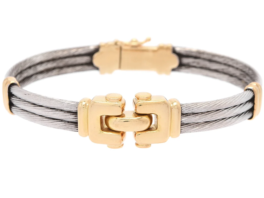 ARMBAND, stelt, 18K guld/stål, öppningsbart, stl 6,0 x 5,0 cm, vikt 32,3 g. — Smycken/Armband — Kaplans
