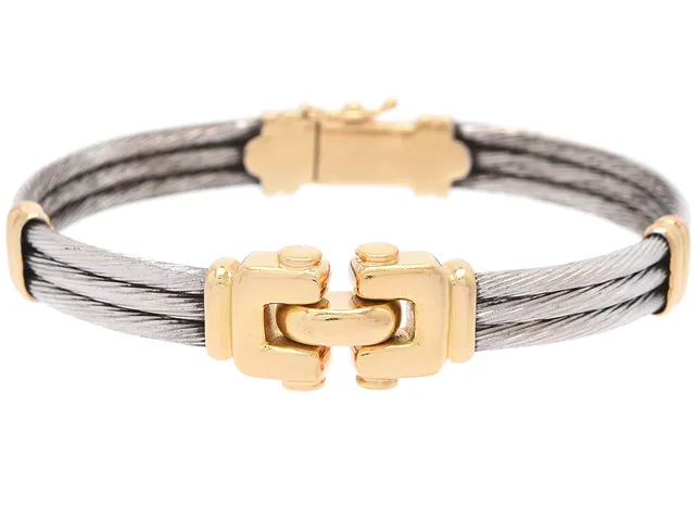 ARMBAND, stelt, 18K guld/stål, öppningsbart, stl 6,0 x 5,0 cm, vikt 32,3 g.