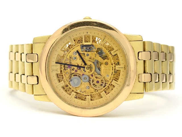 Armbandsur Eterna-Matic, automatisk, 18K med länk 18K 17cm + 3 exra länkbitar, brv 118,9g, no 105 1856, skelettboett