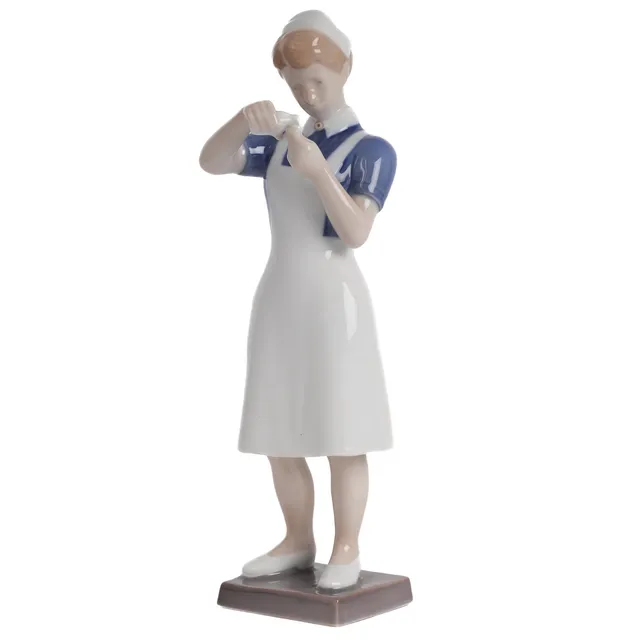Svend Jespersen for Bing & Grondahl, 'Nurse' figurine no. 2379
