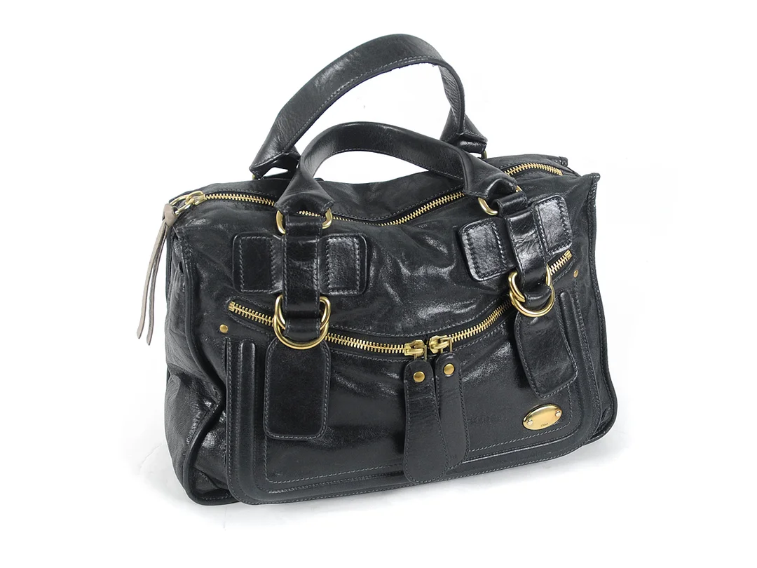 VÄSKA, CHLOÉ, svart läder med mässningsfärgade detaljer, 40x26x12 cm. — Accessoarer/Väskor — Kaplans