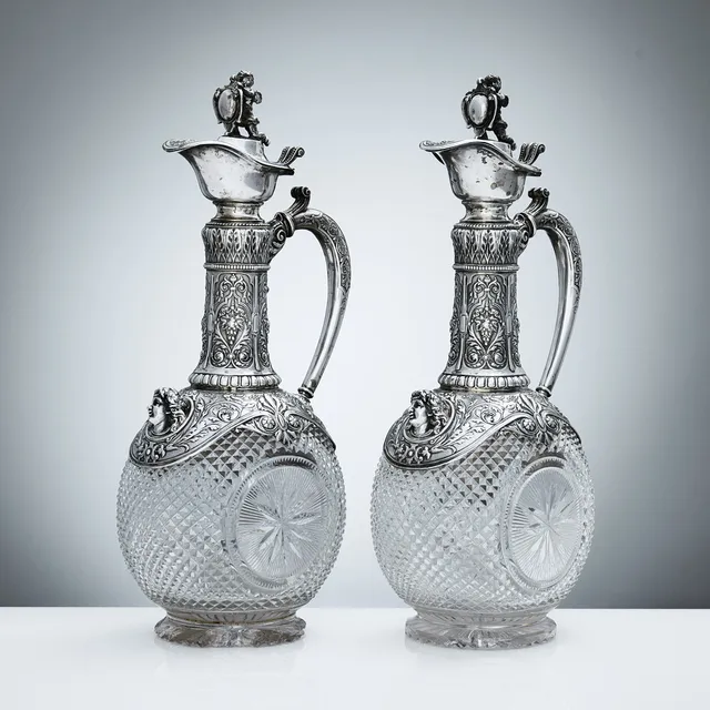 CG HALLBERG. Wine jugs, a pair, glass with silver mounts, Stockholm 1884. Neo-Renaissance.