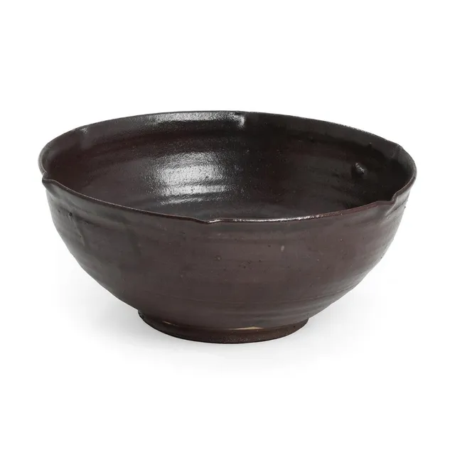 Ulla Hansen: A hard-fired earthenware bowl, decorated with reddish/brown glaze. Unsigned. Unique. H. 13. Diam. 31 cm.
