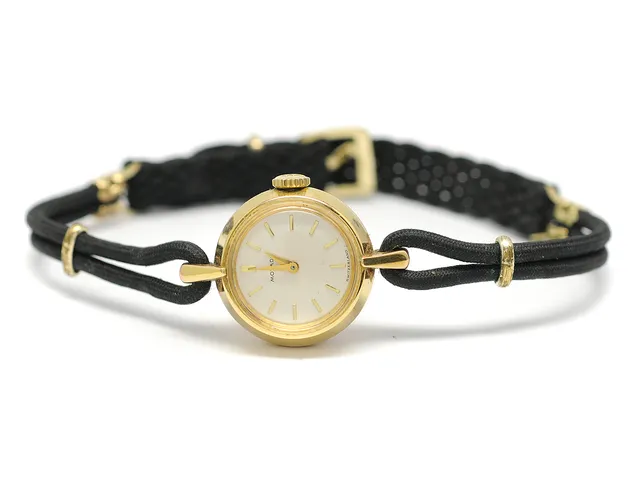 MOVADO, damur, 17 mm, Boett nr. 62614/127, doublé (40 micron), manuell, plexiglas, skadad urtavla, läderband, ca 1955.