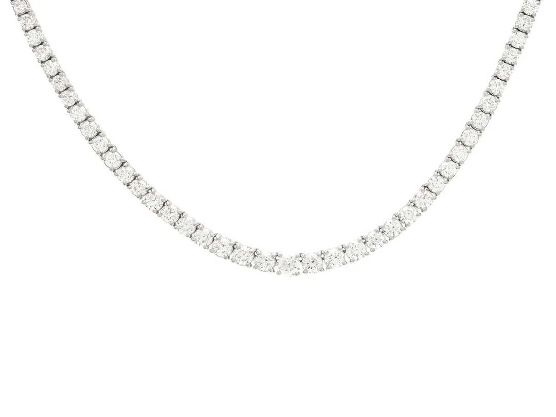 RIVIERECOLLIER, 18K vitguld, 79 st briljantslipade diamanter ca 5,31 ctv, ca TW-W/VS, längd 42,5 cm, vikt 17,6 g. — Smycken/Collier — Kaplans