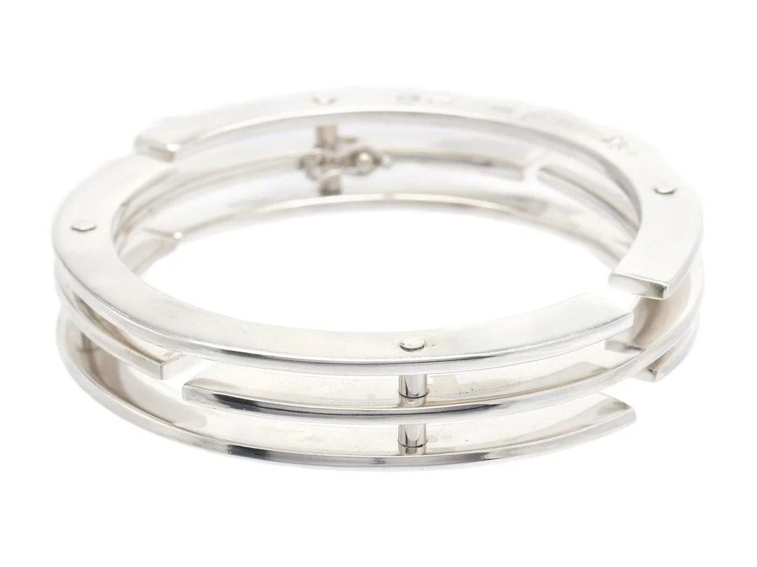 ARMRING, öppningsbar, sterlingsilver, Borås 1995, stl 6,0x6,0 cm, vikt 102,2 g. — Smycken/Armring — Kaplans
