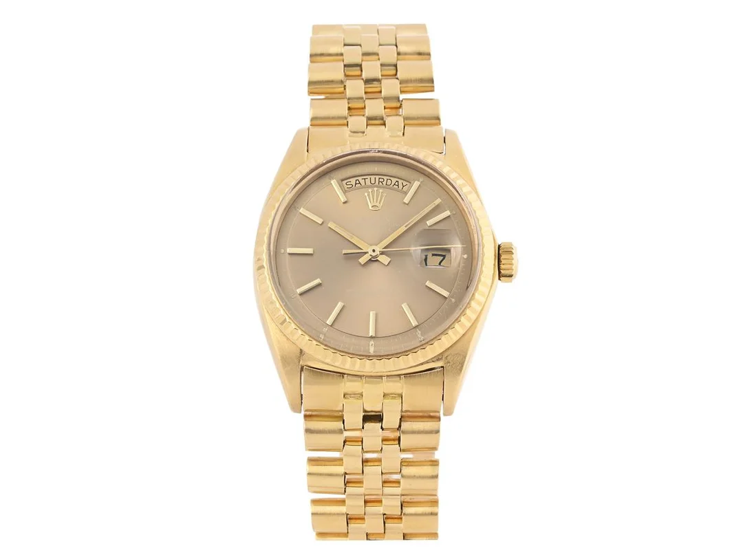 ROLEX, Oyster Perpetual, Day-Date (T Swiss T), Chronometer, Ref nr. 1803, Serie nr. 2750536, Cal 1556, Verk nr. DD875408, Boett nr. 1803, herrur, 36 mm, 18K guld, automatisk, plexiglas, dag, datum, servicebehov, Jubileelänk, Ref nr. 4.70/53, totalvikt 117,9 gram, Chronometercert, ca 1970, box (skadad/ej komplett). — Klockor/Rolex — Kaplans