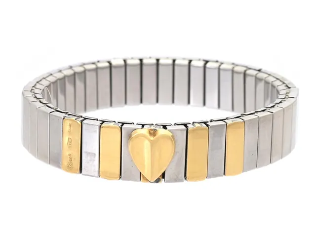 ARMBAND, stål/18K guld, diameter ca 50 mm, justerbar längd, vikt 21,7 g, reseetui.