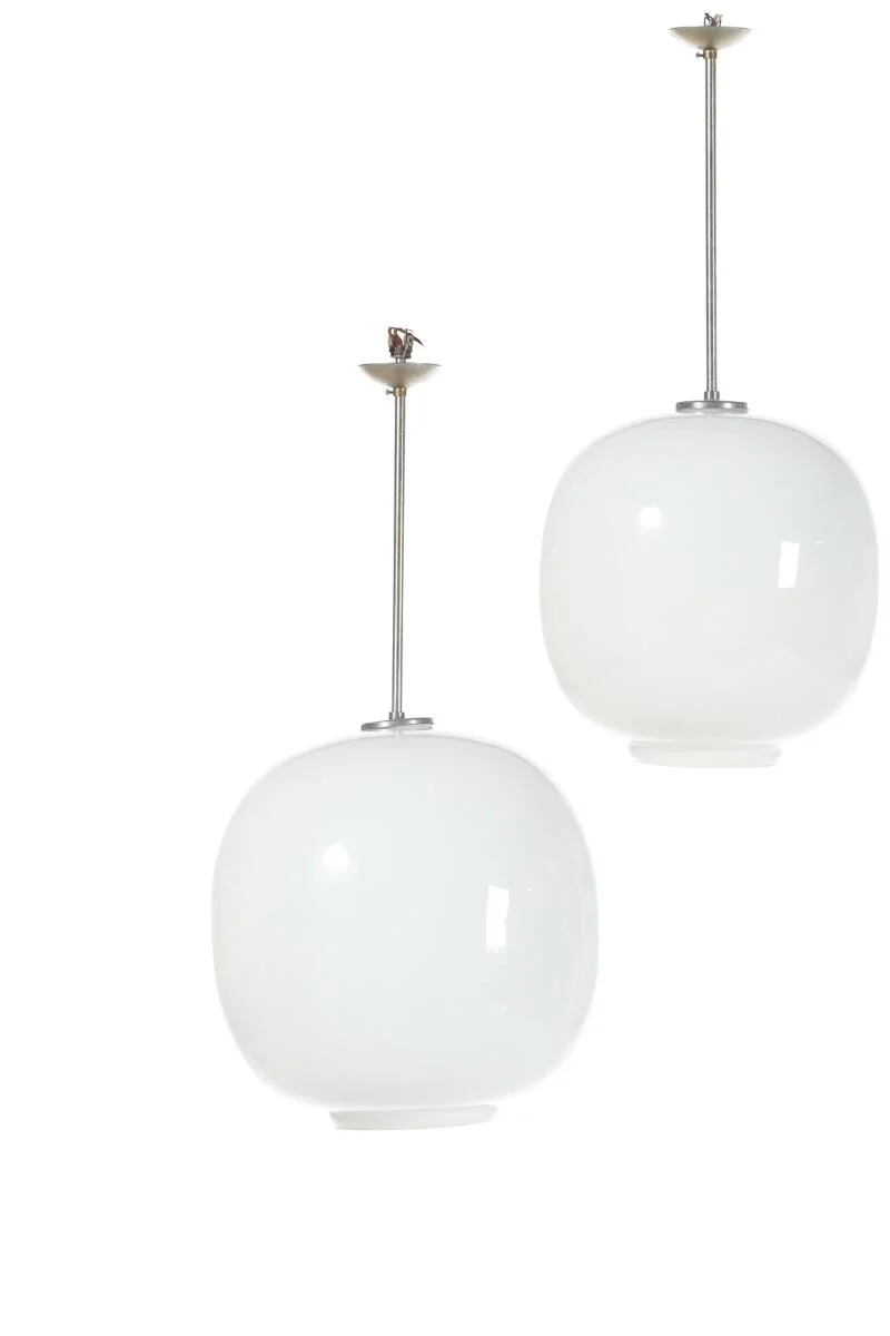 “Radiohus”. Larger and smaller opal glass pendant with nickel-plated metal fittings. Manufactured by Louis Poulsen. H. 33–37. Diam. app. 33–36 cm. (2) — Modern Lighting — Bruun Rasmussen