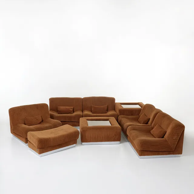 PIERRE CARDIN. Soffgrupp med två bord och fotpall, Domani, England 1970-tal, stoppade och klädda i brun manchester, sarger i kromad metall, borden med spegelglasskivor.