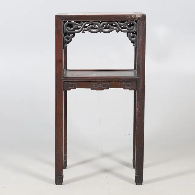 A CHINESE HARDWOOD AND MARBLE TWO TIER JARDINIERE STAND.