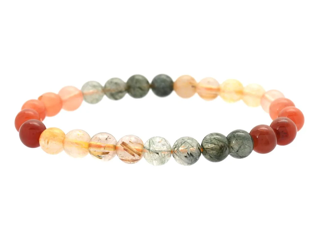 ARMBAND, kulor av quartz, kulornas bredd ca 7 mm, bredd ca 6 cm, elastiskt band, vikt ca 13,2 g. — Smycken/Armband — Kaplans