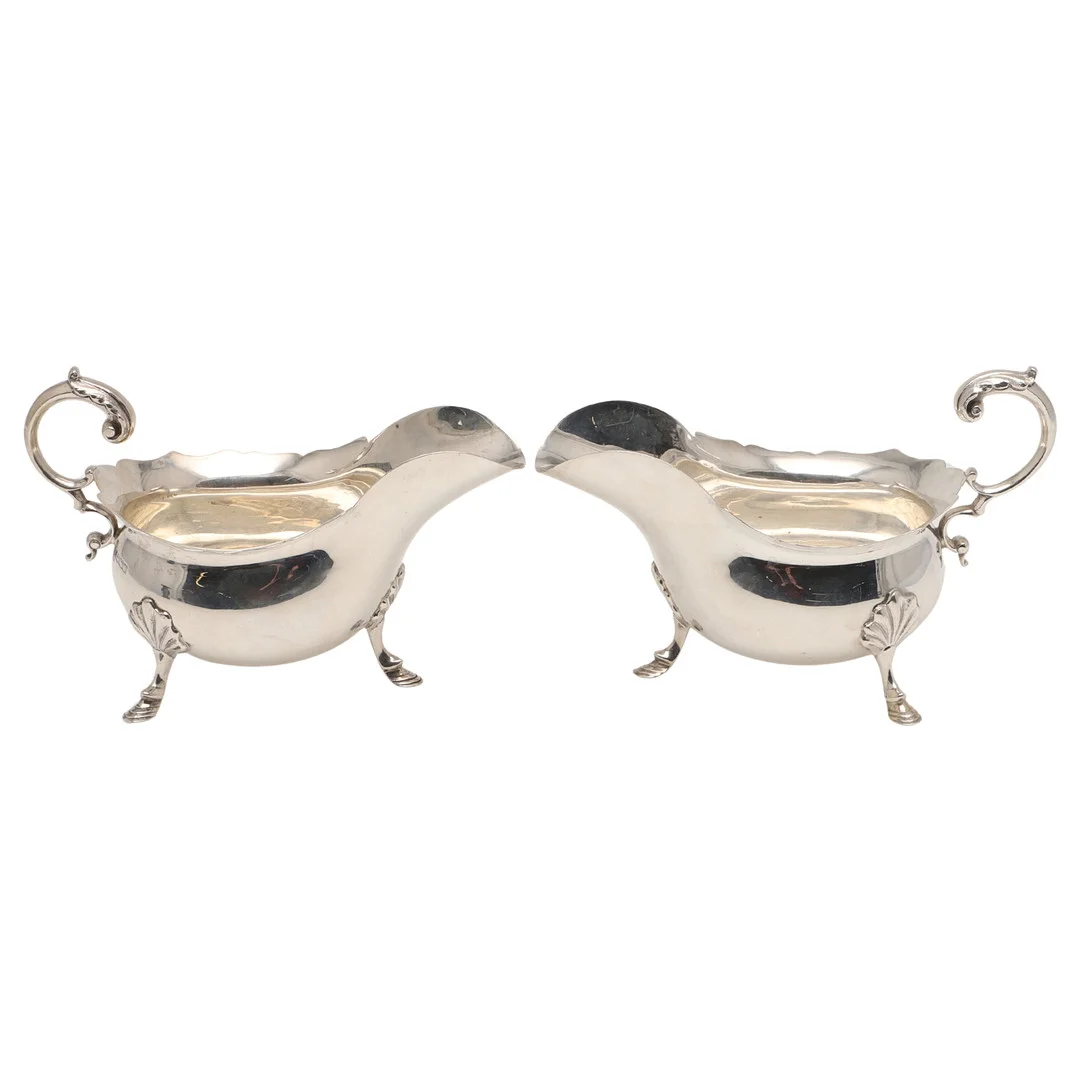 A PAIR OF GEORGE V SILVER SAUCE BOATS. — Silver — Lawrences Auctioneers