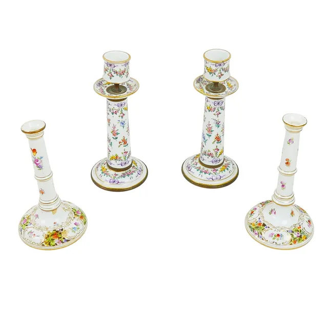FOUR EARLY 20TH CENTURY, HAND PAINTED CONTINENTAL PORCELAIN CANDLESTICKS.