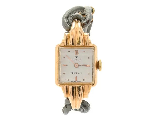 ROLEX, Precision, Serie nr. 497911, Boett nr. 4554, damur, 17 x 36 mm, 18K guld, manuell, plexiglas, skadad urtavla, defekt (går ej, akut servicebehov), formverk, gravyr, integrerat läderband, ca 1948.