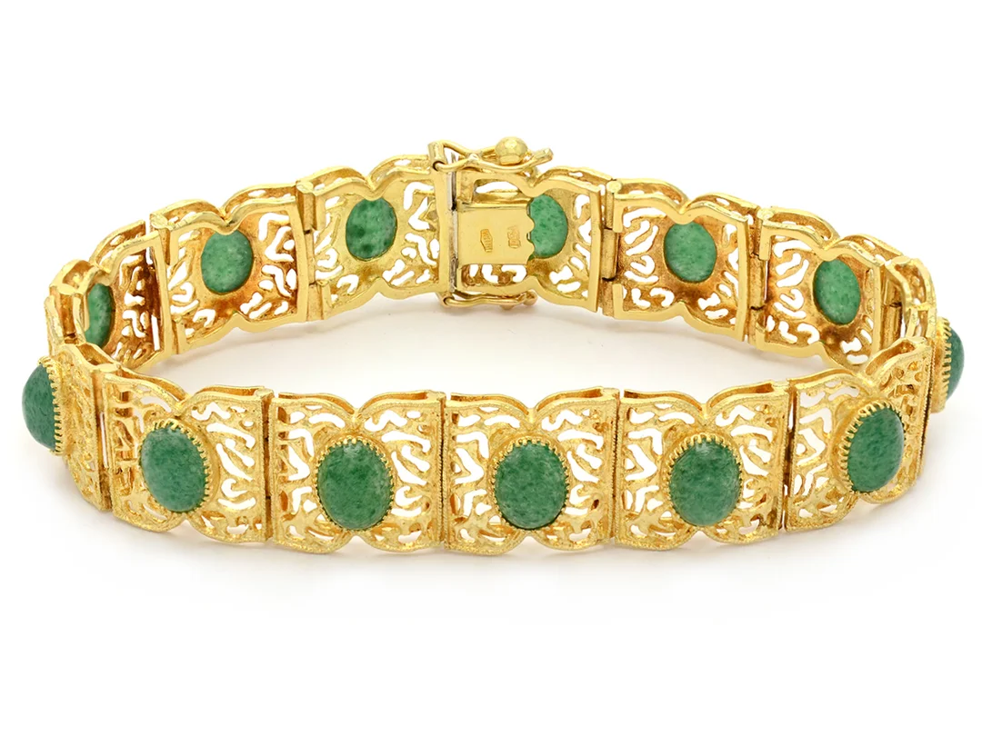 ARMBAND, 18K guld, 12 cabochonslipade aventuriner, längd ca 18 cm, bredd ca 1,4 cm, vikt 29,4 g — Smycken/Armband — Kaplans