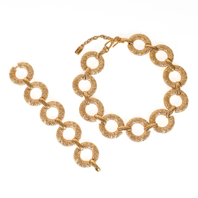 Yves Saint Laurent: Gold-plated necklace and bracelet set (2)