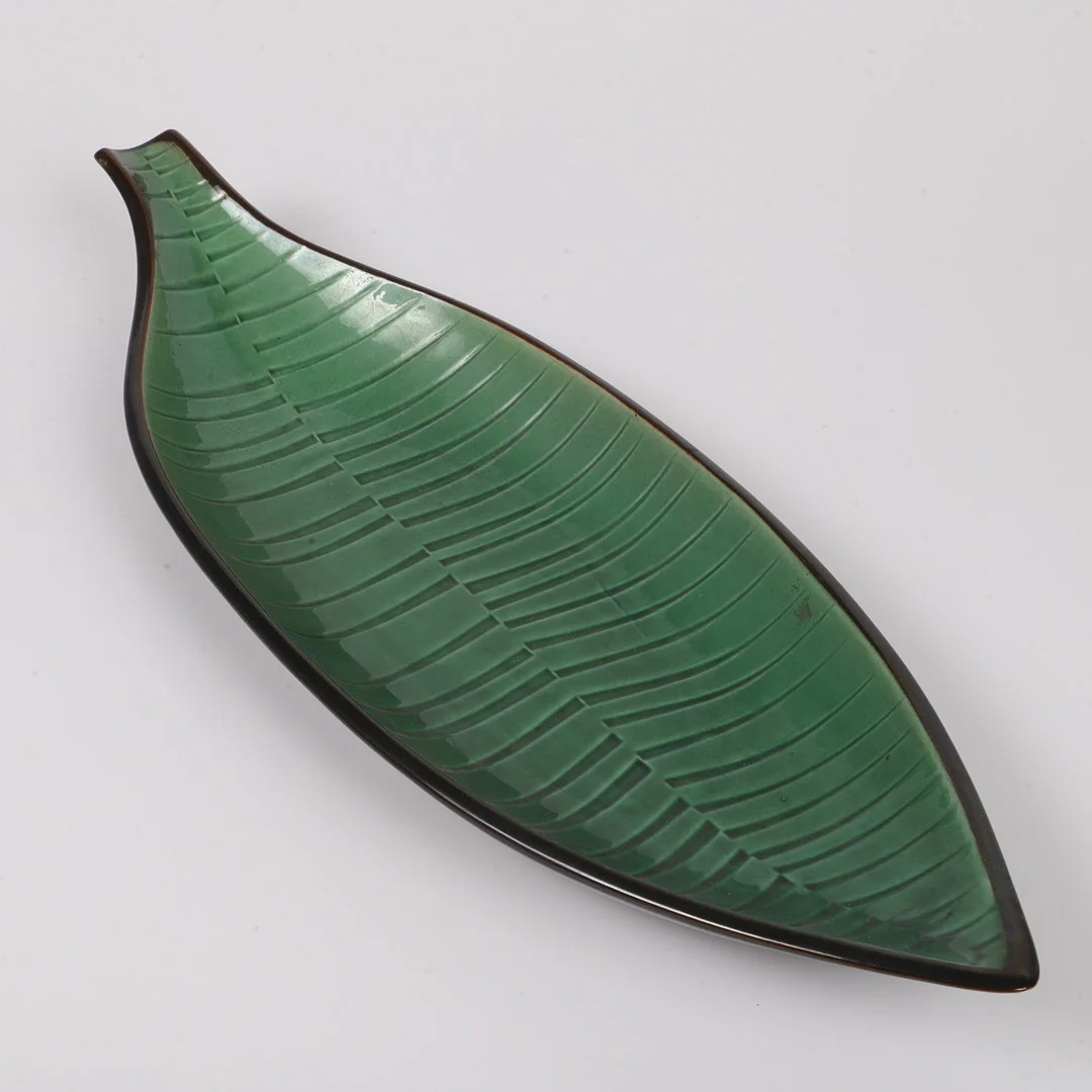 MARIANNE WESTMAN. Fat, blad, porslin, Rörstrand. — European — Helsingborgs Auktionskammare