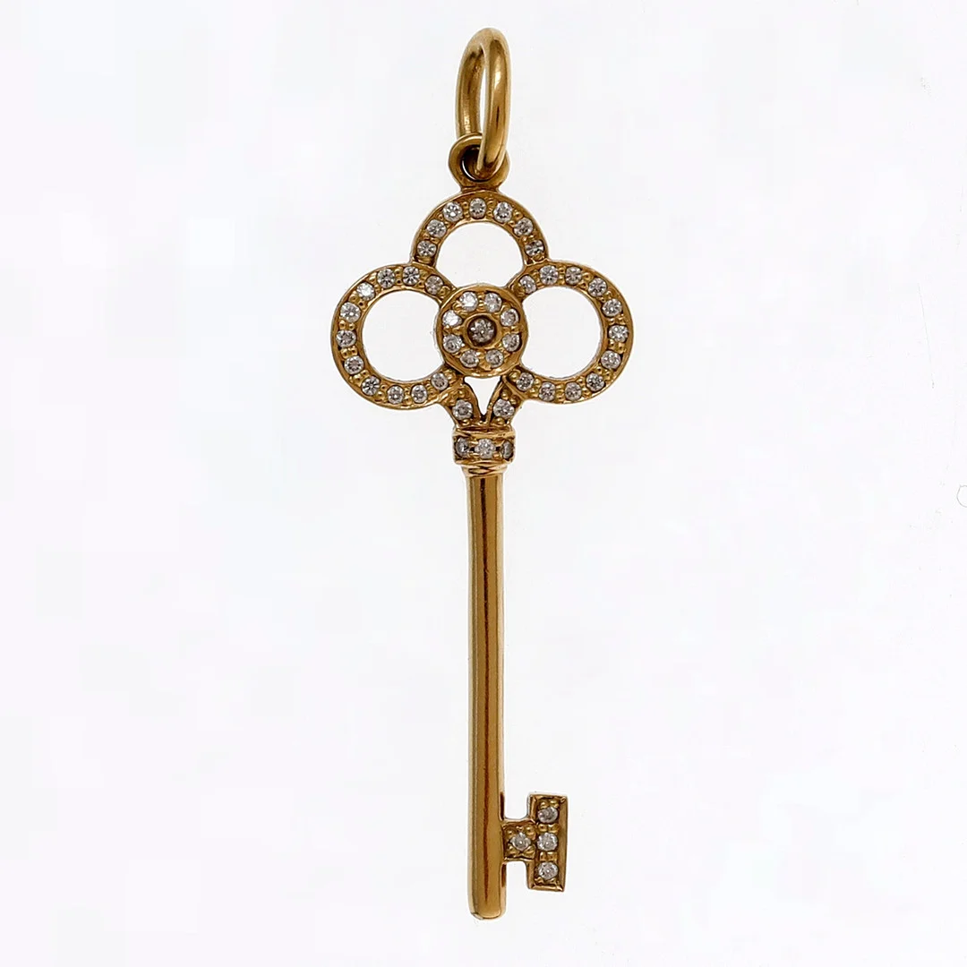 TIFFANY & CO. Pendant in the shape of a Crown key. — Brooches & Pendants — Balclis