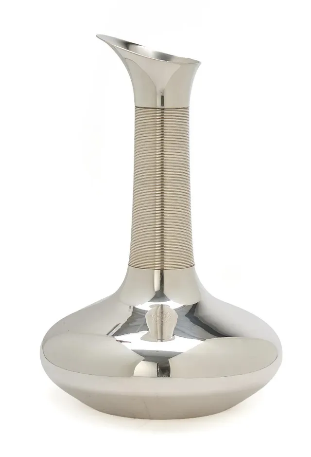 A sterling silver pitcher with smooth surface. Narrow neck with fluted surface. Georg Jensen after 1977. With date letter V11=2019. Weight 805 g. H. 24 cm.