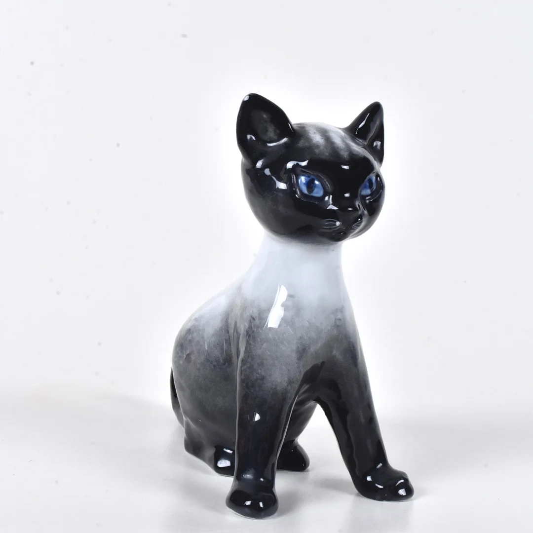 FRITZ HEIDENREICH (1895-1966). Figurin, porslin, underglasyrmålad, Rosenthal, Tyskland, 1950-tal. — European — Halmstads Auktionskammare