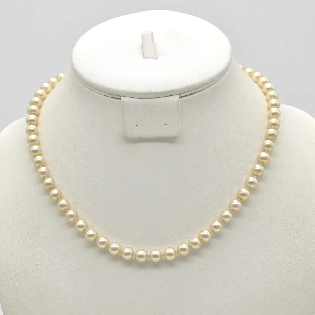 DESIGNER-PERLENCOLLIER, EINZELN GEKNÜPFT, ZWEIFACHER VERSCHLUSS, VERGOLDETER STERLINGSILBER, MITE DES 20. JAHRHUNDERTS. — Necklace — Kunst- und Auktionshaus Kleinhenz