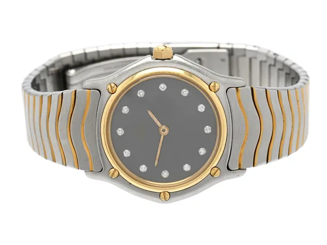 EBEL, Classic Wave, Serie nr. 12661661, Boett nr. 181908, damur, 26,5 mm, stål/guld, quartz, safirglas (repor/nagg), skadade visare, diamanturtavla (12 st. 8/8), integrerad originallänk, viklås, längd 162 mm, ca 1990.