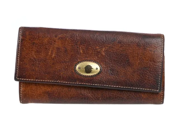 PLÅNBOK, MULBERRY, brunt läder, mässingfärgade beslag, 19x10 cm, mynt, sedel, kort, missfärgat läder, bruksslitage.
