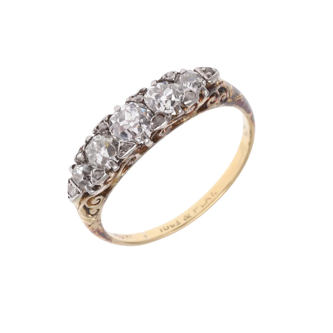 A DIAMOND FIVE STONE RING. — Rings — Lawrences Auctioneers