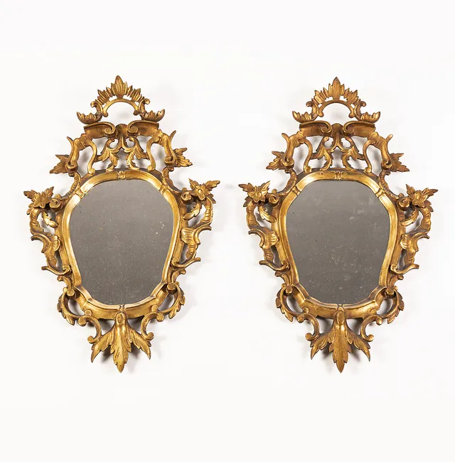 Pair of Charles III style ornamental mirrors in carved and gilt wood, 19th Century.