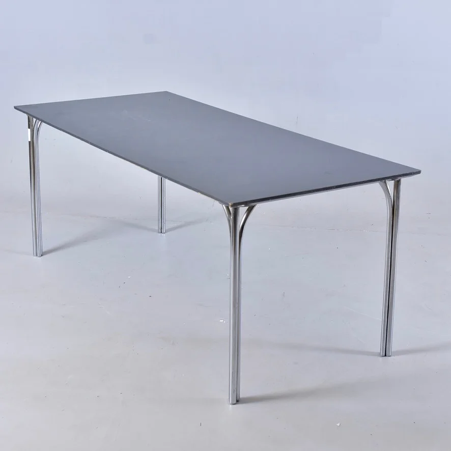 NANNA DITZEL. Matbord, "Trinidad", svartlackerad träskiva med kromade ben, modell 8118, Frederica möbler Danmark. — Tables — Halmstads Auktionskammare