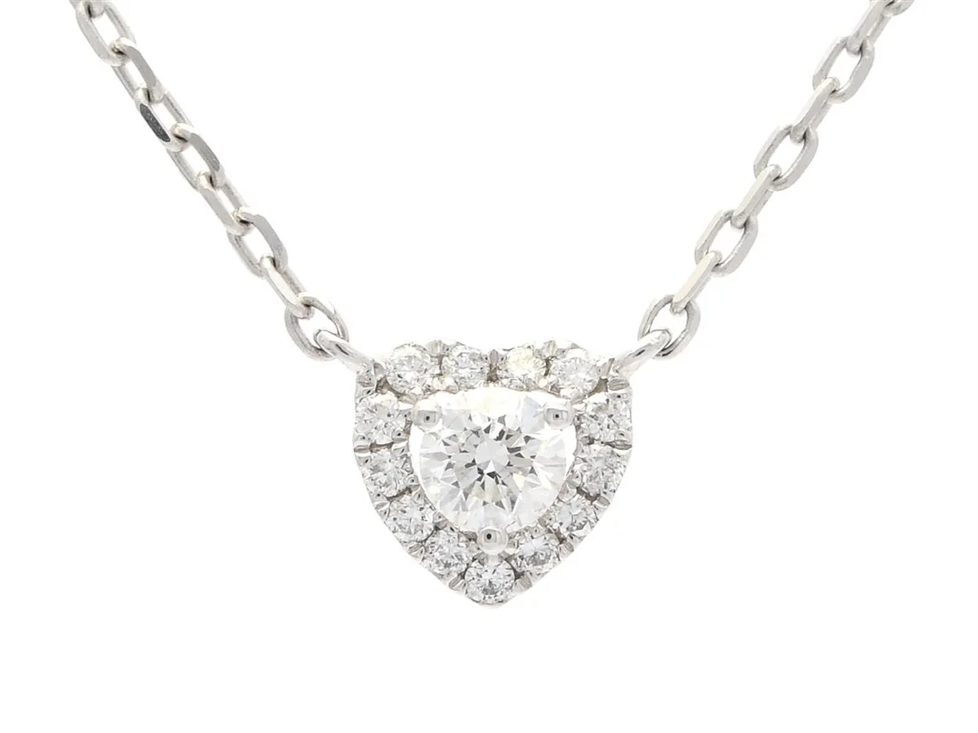 COLLIER, hjärta, 18K vitguld, 14 briljantslipade diamanter ca 0,30 ctv, ca TW-W/SI, längd 43 cm, vikt 2,6 g. — Smycken/Collier — Kaplans