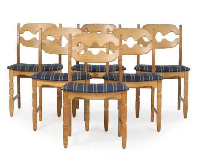 A set of six oak chairs, upholstered with blue striped wool. Model 66. Manufactured by Nyrup Møbelfabrik. (6)