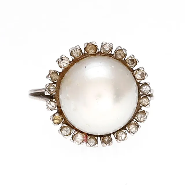 Pearl ring trimmed with diamonds, mid 20th Century.