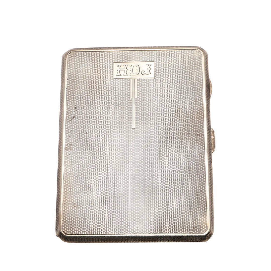 AN ART DECO SILVER CIGARETTE CASE. — Silver — Lawrences Auctioneers